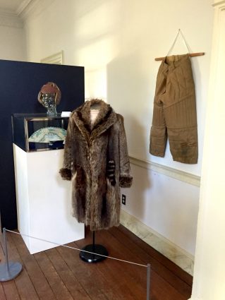 Gallery 3 - A Sears tomboy coat made of possum and raccoon tails as well as a football helmet and pants are featured in the exhibit.