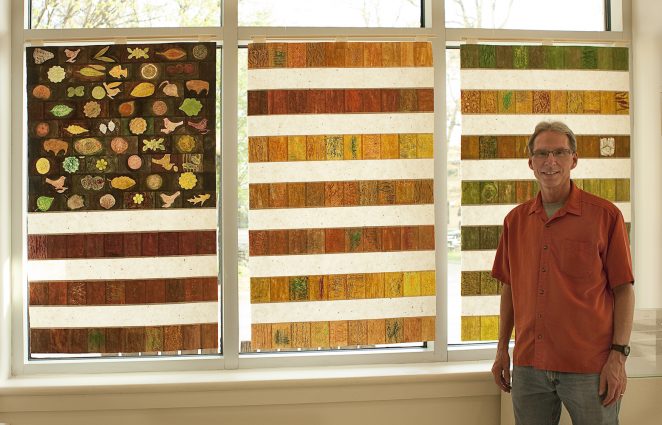 Gallery 4 - Marc Robarge created “This Land,” an American flag image made from rubbings of surfaces such as tree bark.