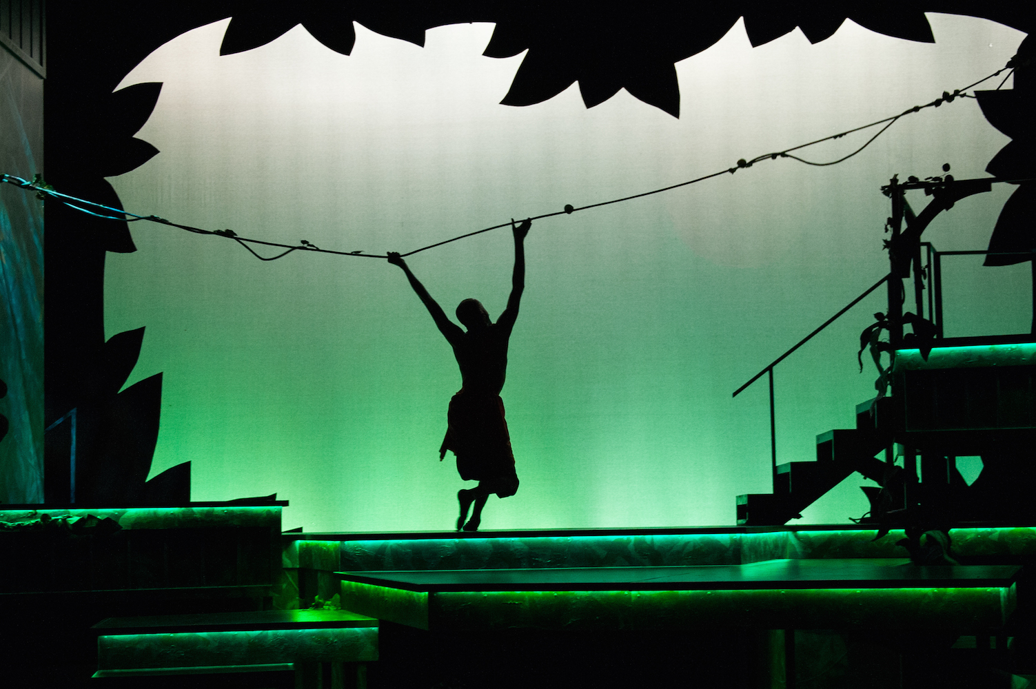 Gallery 3 - Mowgli (Justin Weaks) swings through the tops of the trees of the jungle in 
