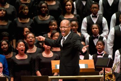 Stanley J. Thurston conducting the Children of the Gospel Choir.
