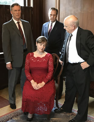 Inspector Hubbard (Mark Shullenbarger) questions Margot Wendice (Tracy Husted), while her husband Tony (Ted Culler) and her lover Max (Mark Steimer) look on.
