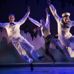 Gallery 4 - Flying high: Robert Mintz (Ensemble), Lance E. Hayes (Ensemble) and Rhett Guter (Gabey) show off their dancing skills.