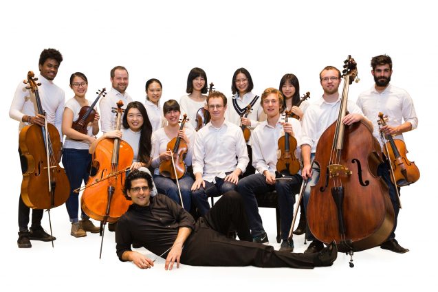 Amit Peled with his former students, The Mount Vernon Virtuosi. The ensemble brings classical music to the community.