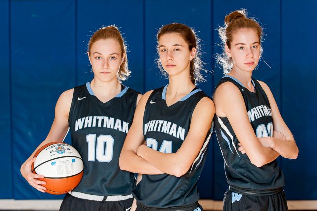 Jacqui South’s portrait of the Maryland 4A state championship-winning Walt Whitman High School Vikings basketball team stars -- sisters Abby, Emily and Olivia Meyers – in 2016. 