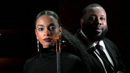 Violinist Jessica McJunkins and timpanist Donnie Johns perform with Soulful Symphony, an orchestra of primarily black and latino musicians that will soon take up residency at Merriweather Post Pavilion.